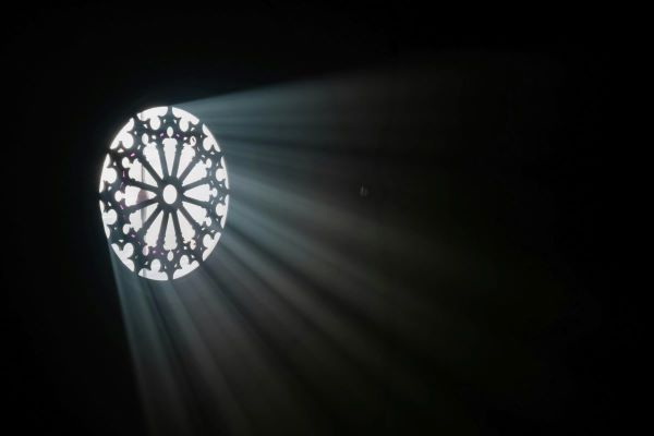 Light shining through a church window.